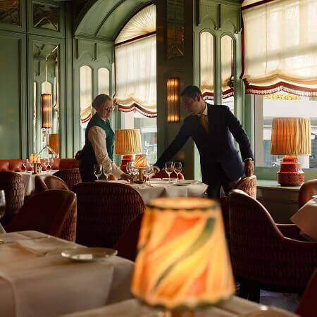 2025 Baur's Lifestyle Team setting up Tables 2 w